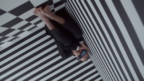 man in a geometric illusion