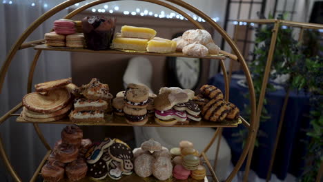 dessert tray at wedding gimbal footage with cookies muffins and other desserts