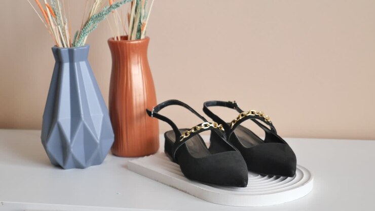 Elegant Black Slingback Shoes with Gold Chain Detail