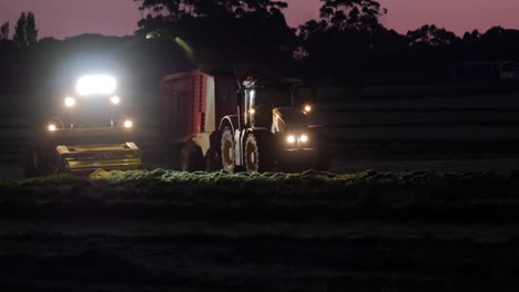 tractor - chopper working at night with spotlights