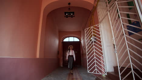 romanian girl visits the old library in resita, romania 2