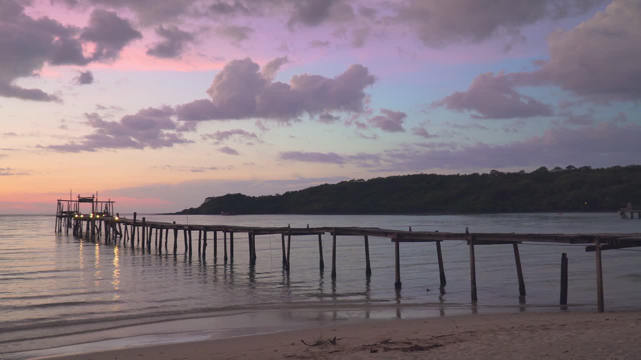 Beautiful Sunset Over A Pier On A Tropical Beach