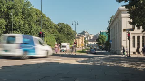 busy road traffic in oslo city centre, time lapse of commuter traffic