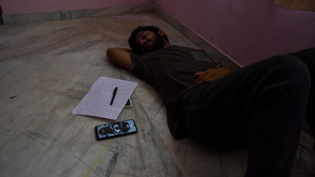 Alone writer sleeping after writing letter to nature in the pendemic and lockdown time