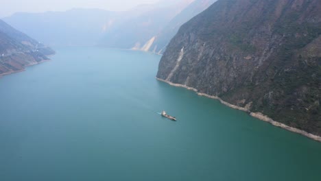 landscape along the yangtze river in china, ship travelling in the long river