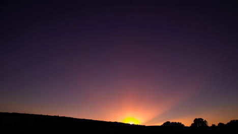 sunset/sunrise over mountains