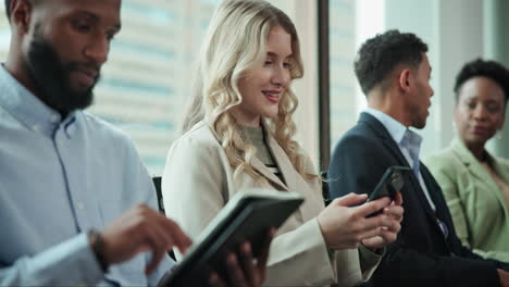business professionals using technology in a corporate setting