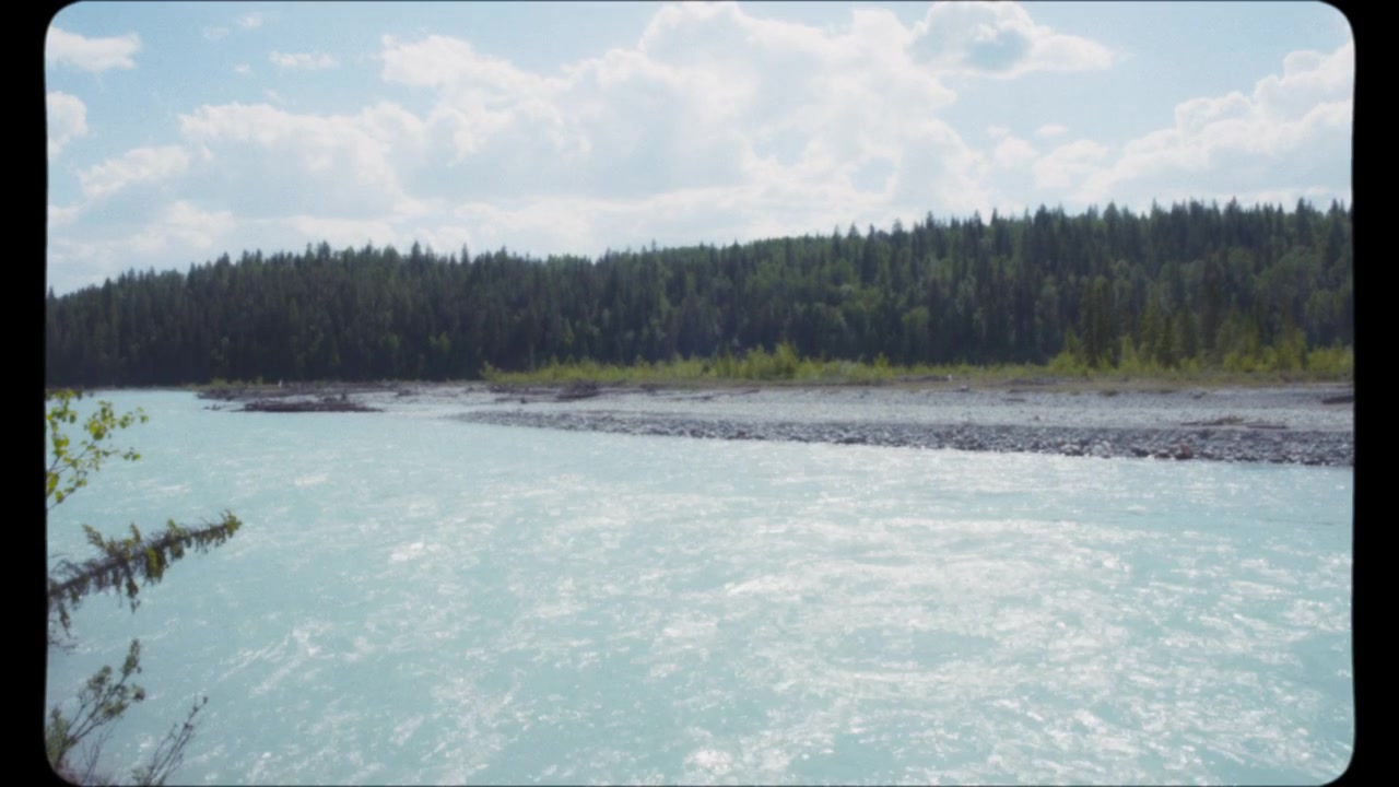 Glacier river flowing in summer