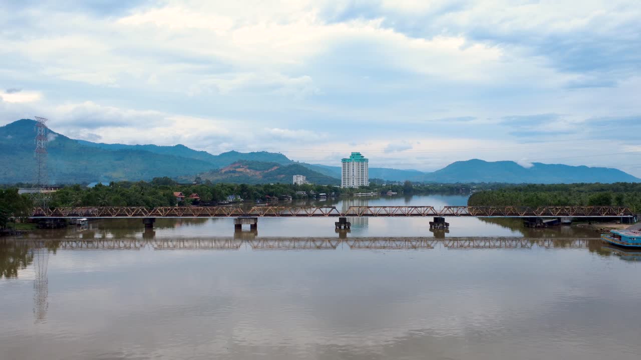 Praek Tuek Chhu River old railway bridge Kampot Cambodia over aerial drone
