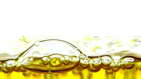 water oil bubbles  behind glass background