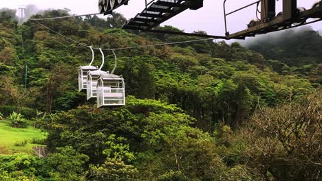 cable car furnicular goes down mountain in monteverde costa rica cloud forest