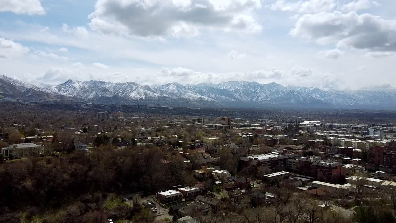 Downtown neighborhood of Salt Lake City with mountain background.