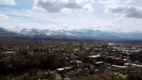 downtown neighborhood of salt lake city with mountain background.