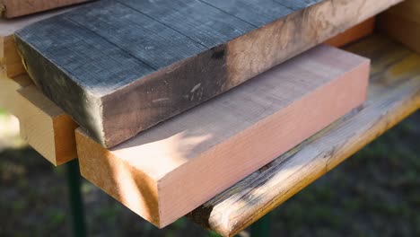 pile of boards for woodworking closeup slow motion