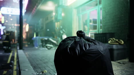 urban alley at night with trash and neon lights in the background