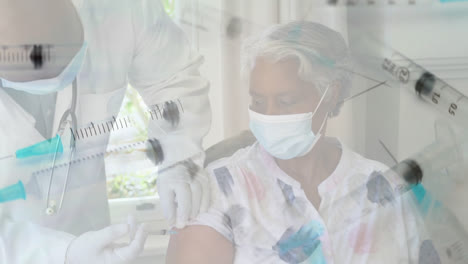 animation of syringes over doctor giving vaccination for masked senior female patient
