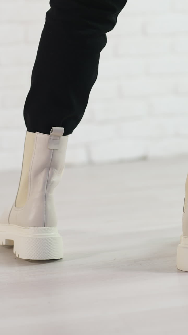 Stylish shoes posing in studio. Elegance fashionable footwear posing. Vertical video