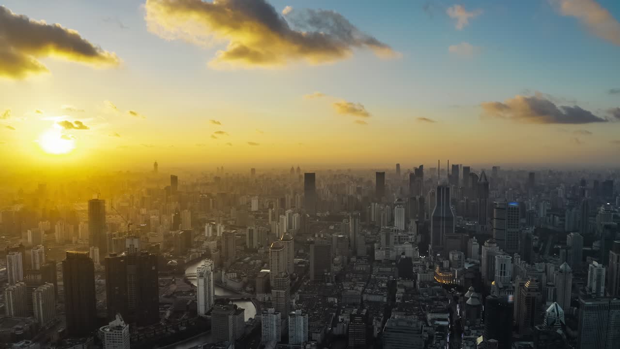 Aerial view of city skyline and modern buildings in Shanghai at sunset