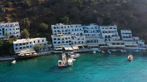 magnificent architecture and scenic coast of loutro village in the southern island of crete, greece - aerial shot