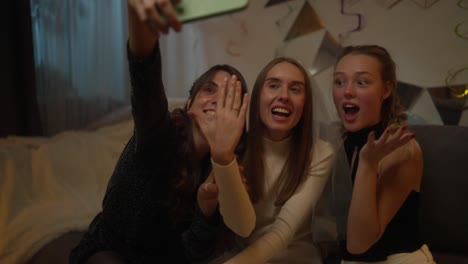 friends taking a selfie at a party