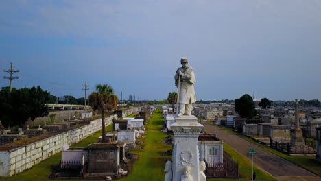 new orleans cemeteries are known for their statues and large tombs