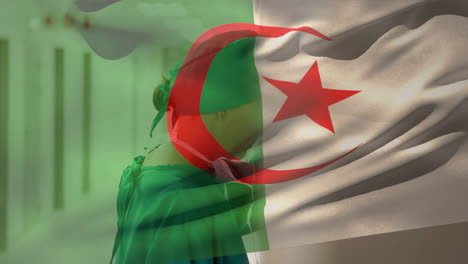 digital composition of algeria flag waving against stressed caucasian female surgeon at hospital