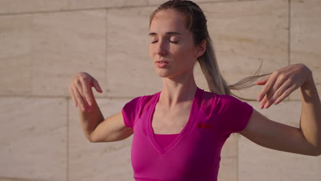 woman meditating outdoors