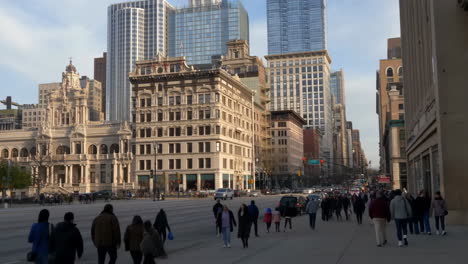 busy city street scene with pedestrians and architecture