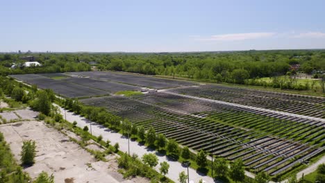 shot birds eye view of solar panels using photovoltaic cells to produce renewable energy