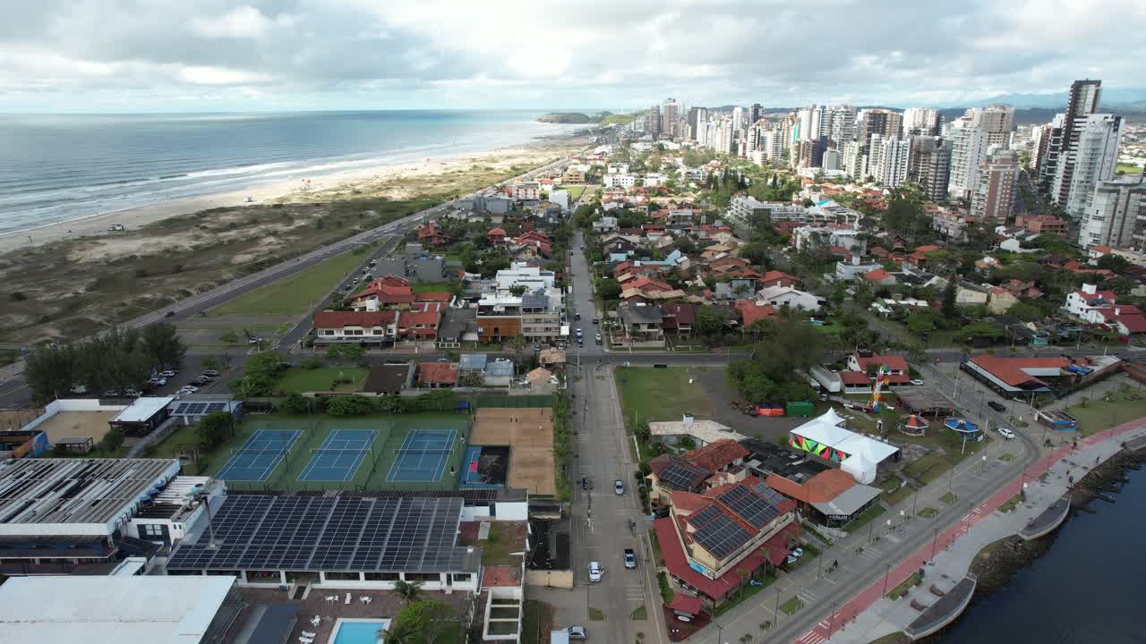 aerial view of the city of torres, in southern brazil, beautiful landscape and city in the background, showing sea to the side