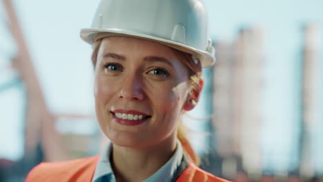 portrait of a smiling female engineer or construction worker