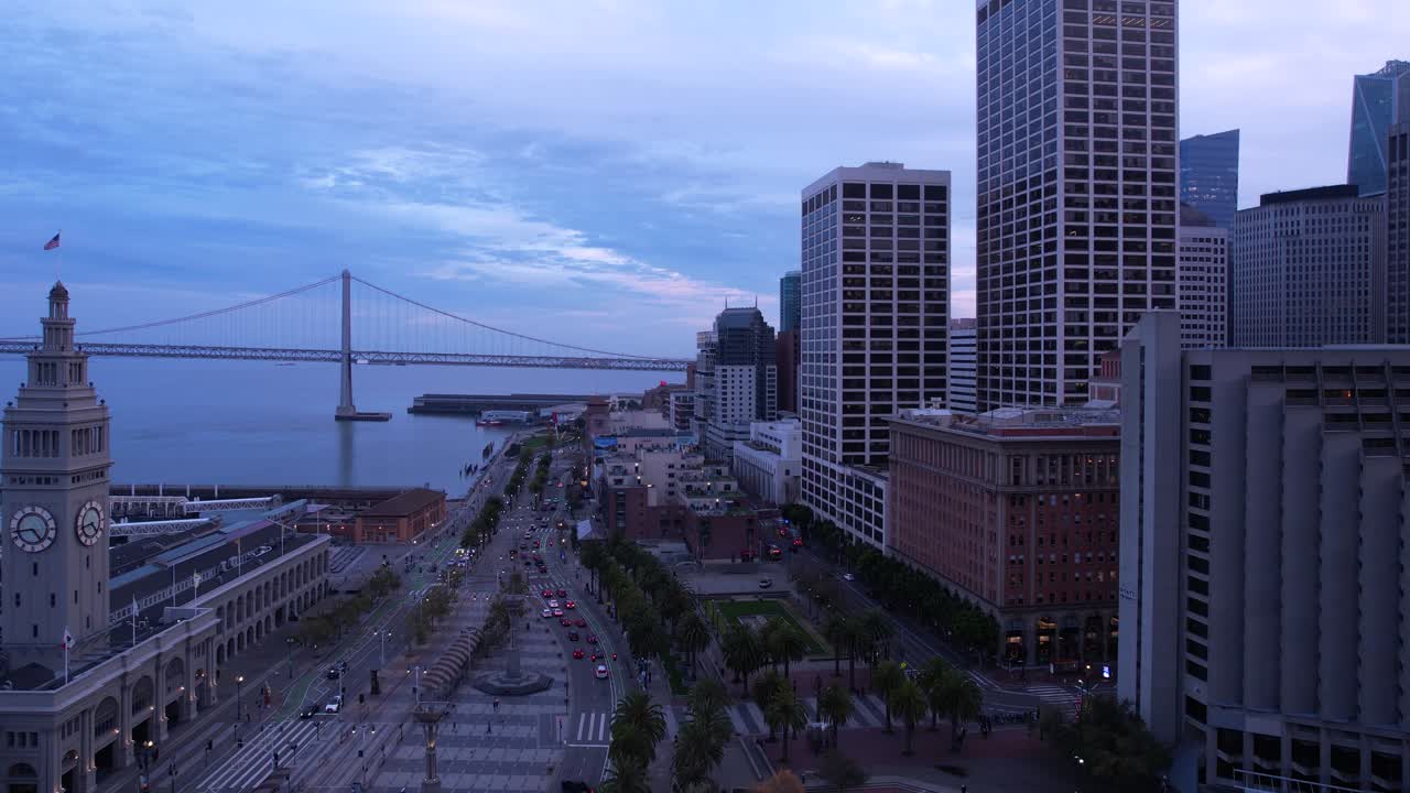 San Francisco, California USA. Aerial View of The Embarcadero, Ferry Building and Twilight Traffic