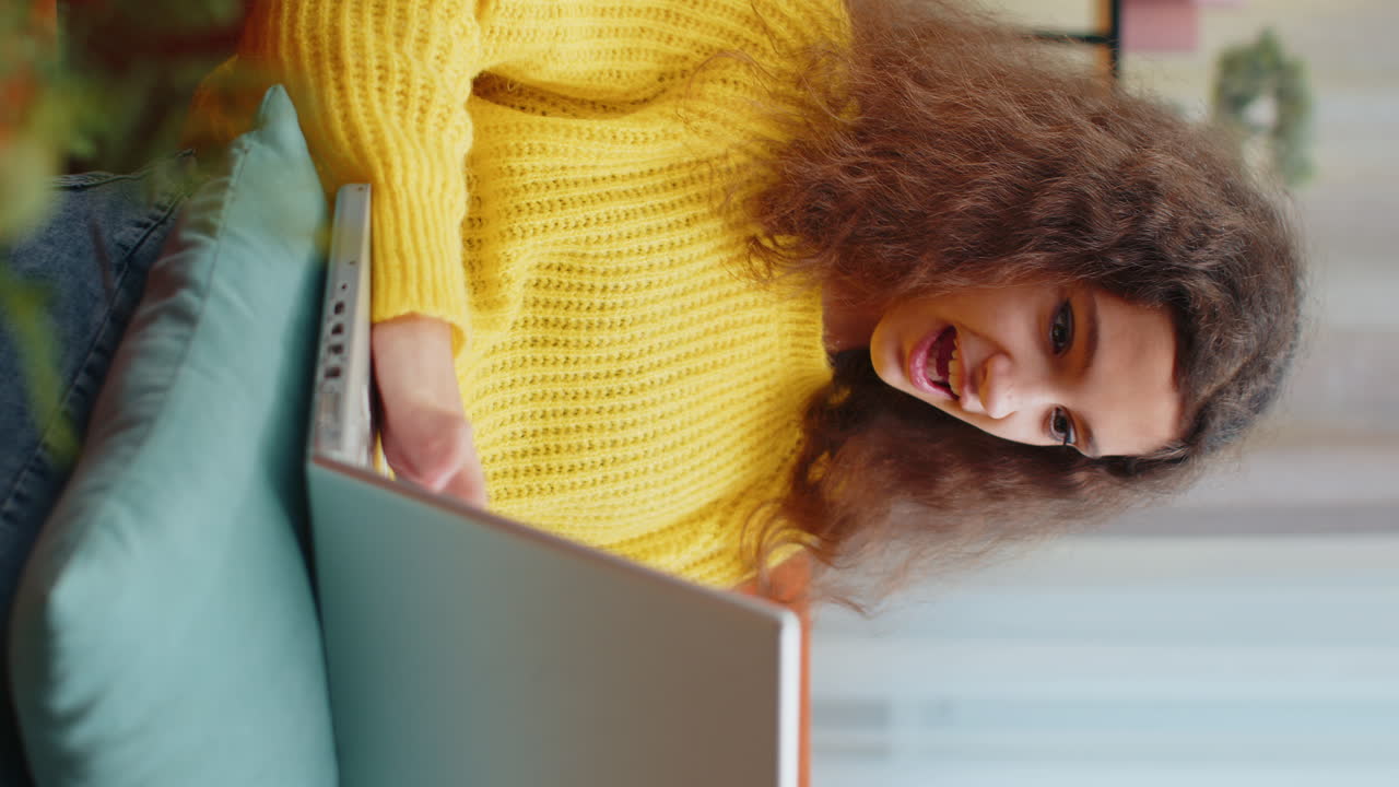 Amazed teen girl use laptop computer receive good news message shocked by victory celebrate win