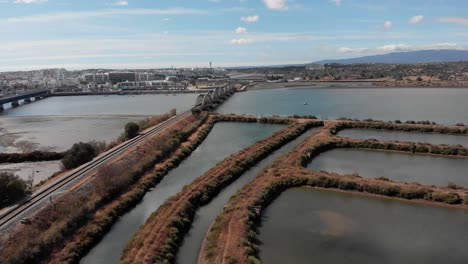 arade bridge and river with salt beds and city in the distance