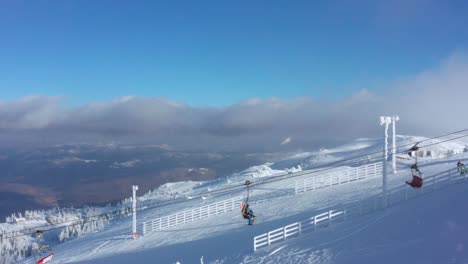 tourists using ski lift on jahorina mountain