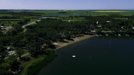 a wide establishing shot of kerry park beach in turtle mountain killarney manitoba canada