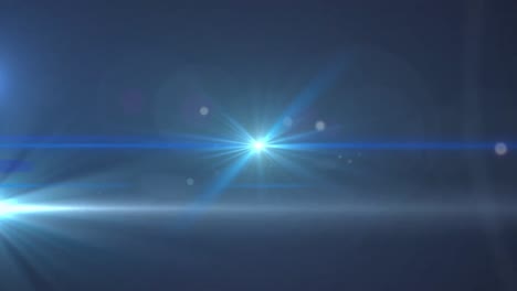 animation of glowing light spots moving on blue background