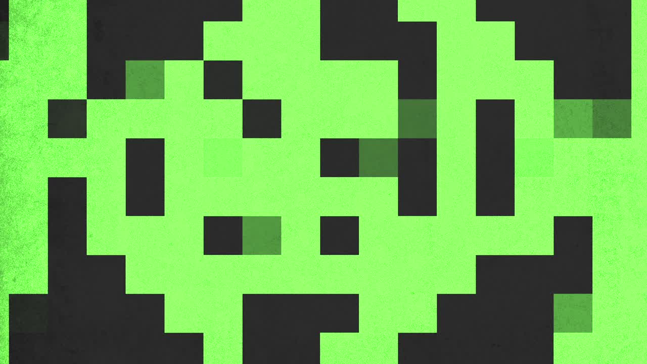 A pixelated green face with black outlines is depicted in this image. The face features various shades of green squares, creating a unique and striking visual effect