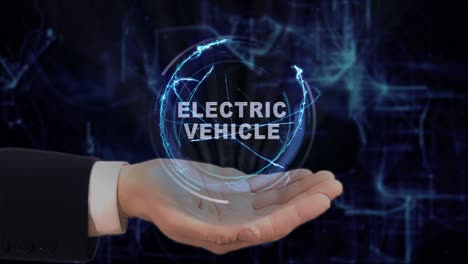 painted hand shows electric vehicle