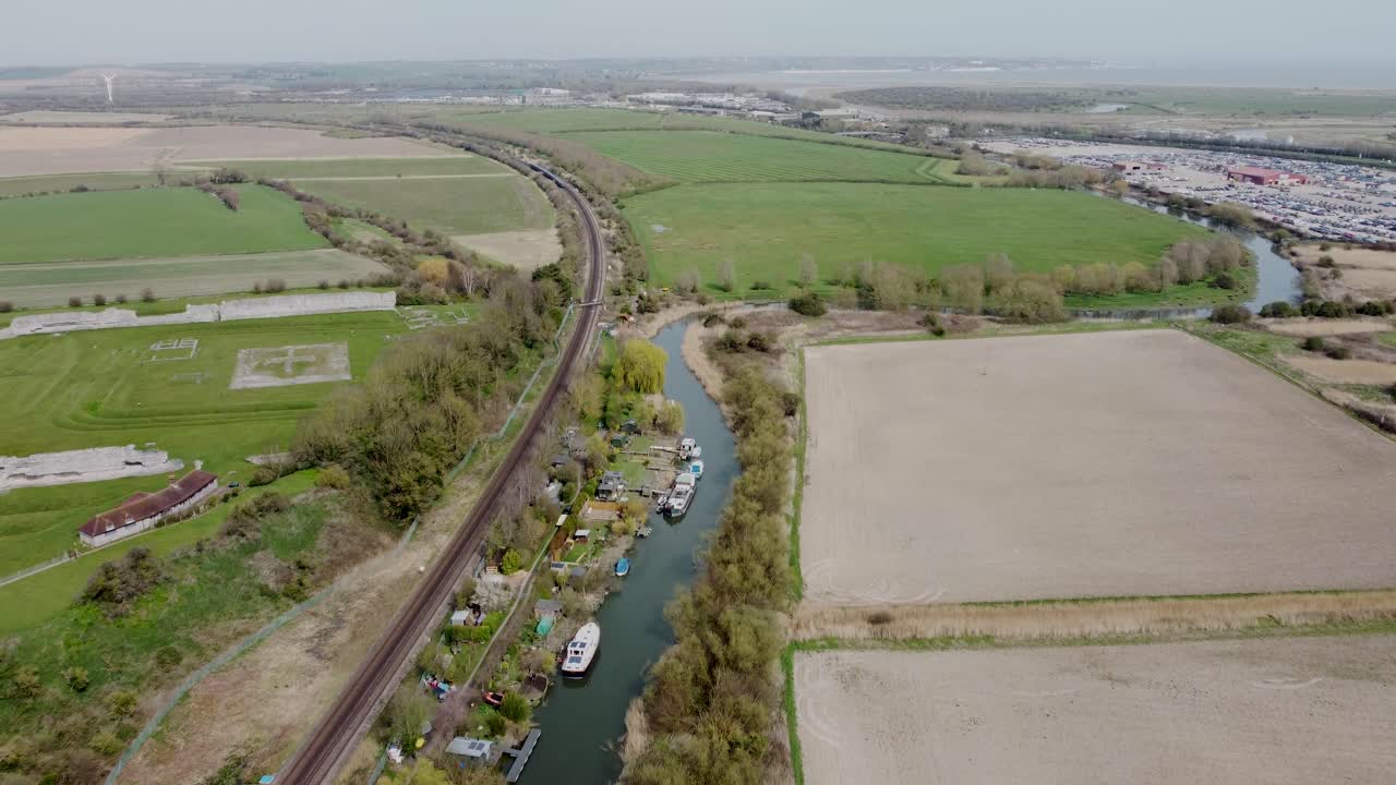 Aerial drone shot of the River Stour in Kent, England. Stour forms most of the county border between Suffolk and Essex.