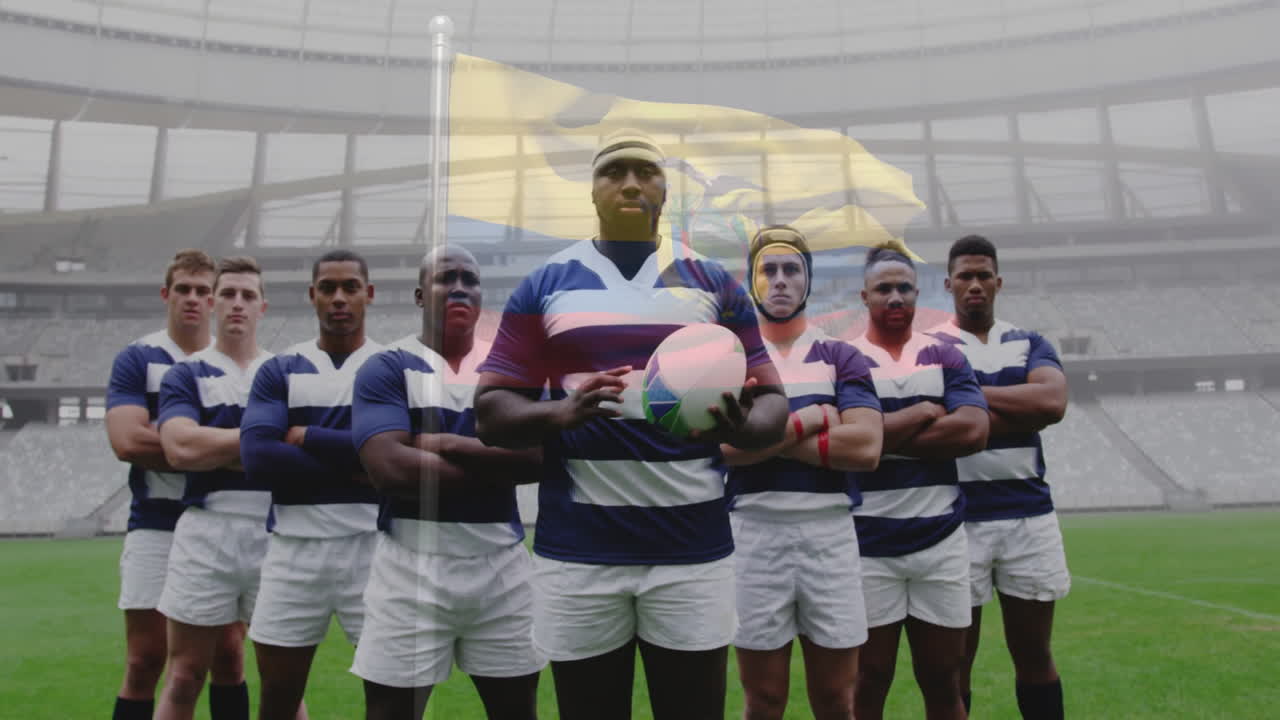 Rugby team holding ball, standing confidently on field with stadium in background