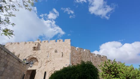 exterior view of the jerusalem city wall in the old town. slow motion.