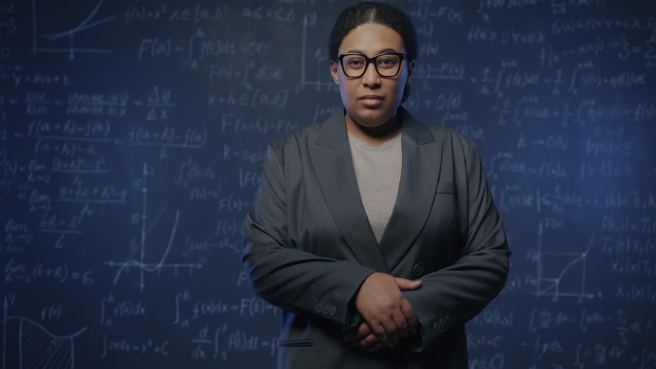 Black Woman Professor in front of equations