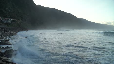 waves crashing on the rocks in the north coast of the island of madeiro, portugal