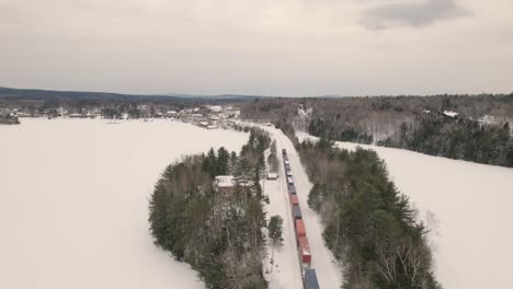 train going through the winter mountains