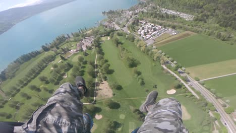 magnificent landscape view of switzerland from a paraglider's camera - aerial shot