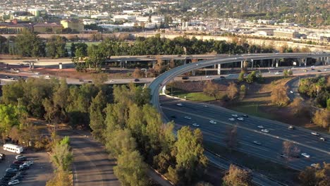 the glendale 2 and ventura 134 freeway interchange in the eagle rock neighborhood of los angeles, california - ascending aerial view