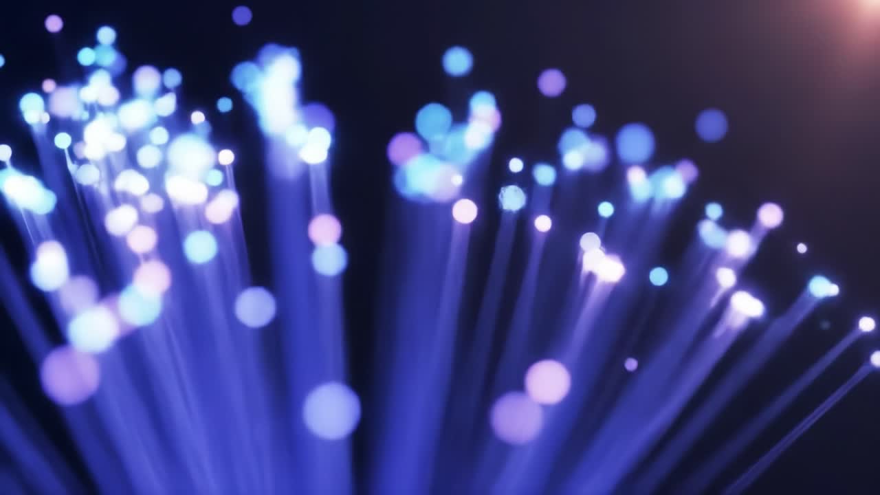 Bright bursts of colorful lights radiate in various directions against a dark backdrop, creating a captivating visual experience. The scene is filled with energy and dynamic motion.