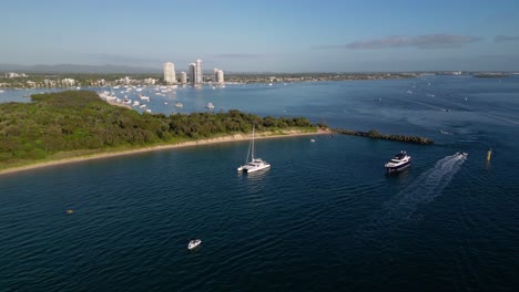 aerial views of luxury yachts near wavebreak island and the broadwater on the northern end of the gold coast, australia