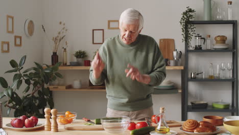 elderly male blogger telling about food on camera